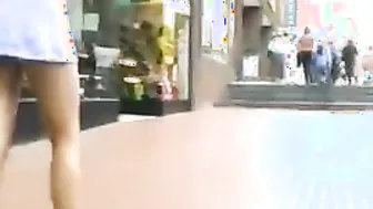 Peeping on a leggy redhead in public