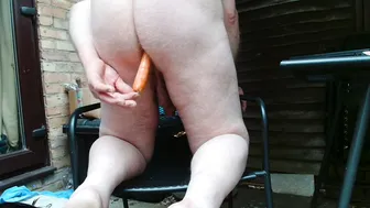 me playing naked in my garden with a carrot in my ass