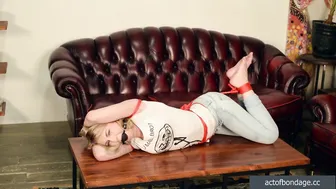 Kate bound in an over-arm position 2